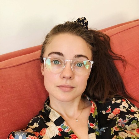 Hannah Kasulka is posing for a photo.